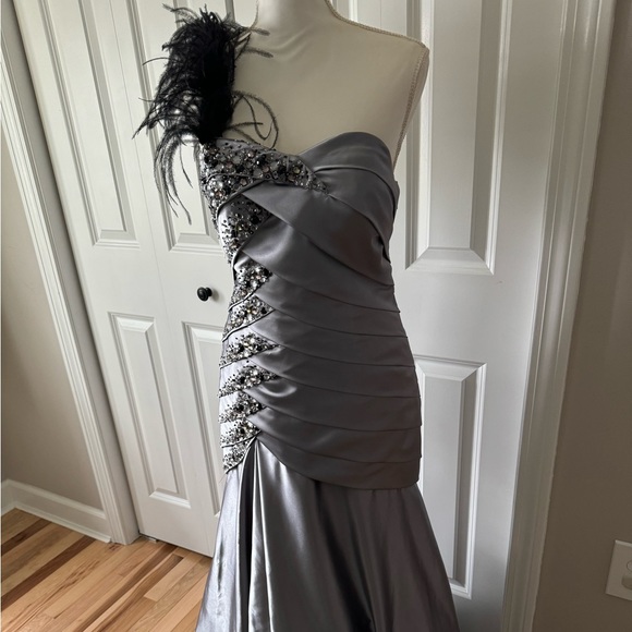 Maggie Sottero Dresses & Skirts - Never Worn!! Beautiful prom gown with stunning beading and feather shoulder